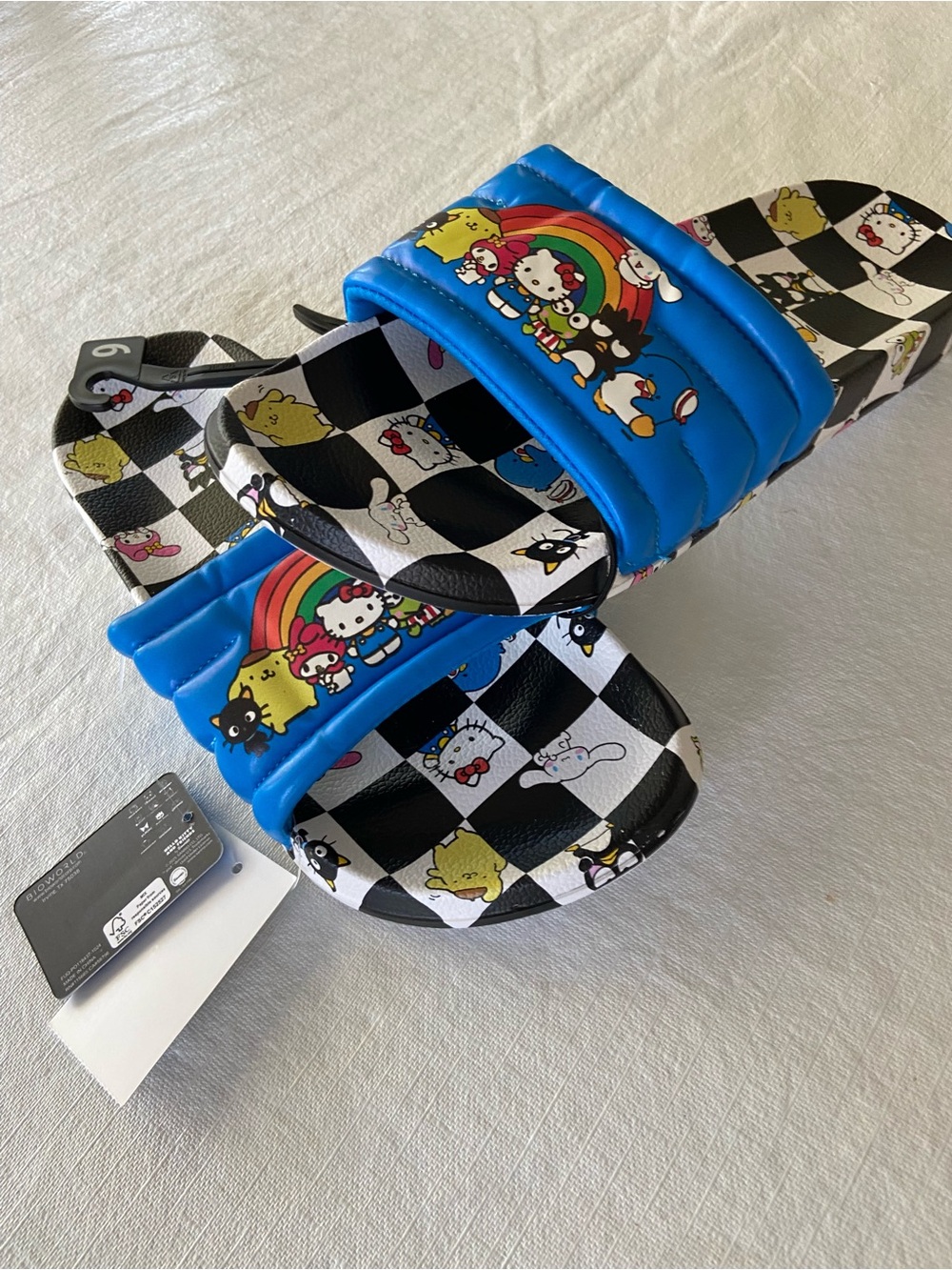 NWT Unisex Hello Kitty Size Womans size 10.5 - (Mens 9) Blue & Black Slides